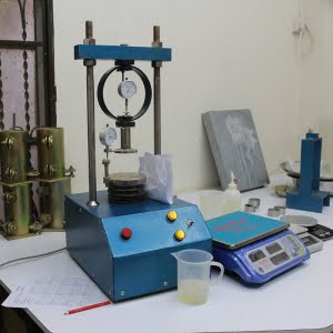 UNCONFINED COMPRESSION DEVICE